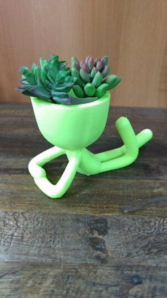 ROY MINI-05 MINI ROY DEITADO RESINA AMARELO